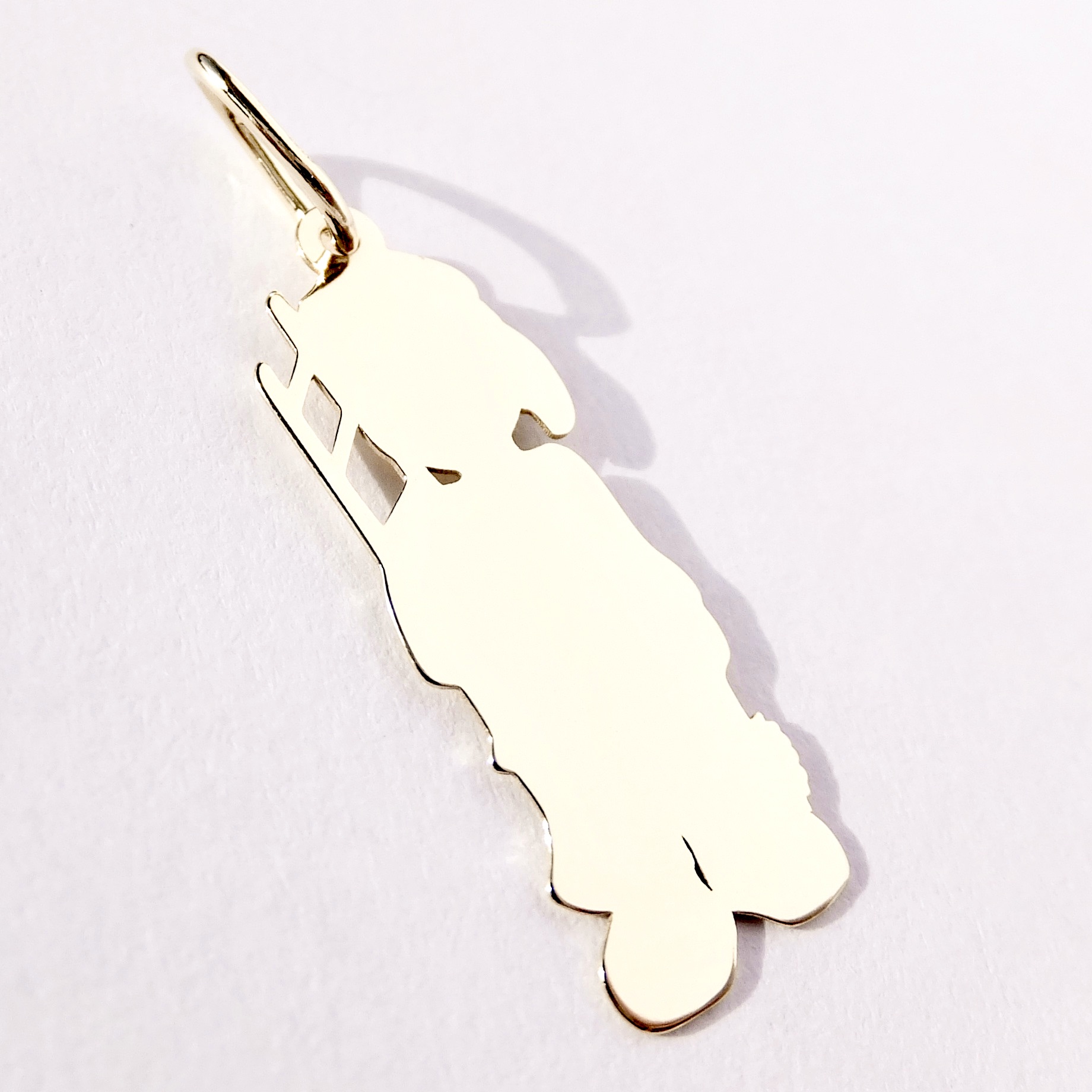 Zlatý přívěsek kominíček, 14K 585/1000, váha 0,92 g